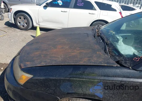 2003 Saturn Ion 2 из США, поврежденный, VIN 1G8AJ52F23Z183427